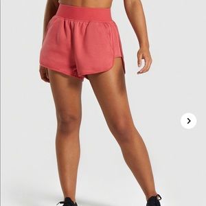 ISO Gymshark Legacy shorts in Large (Brick)